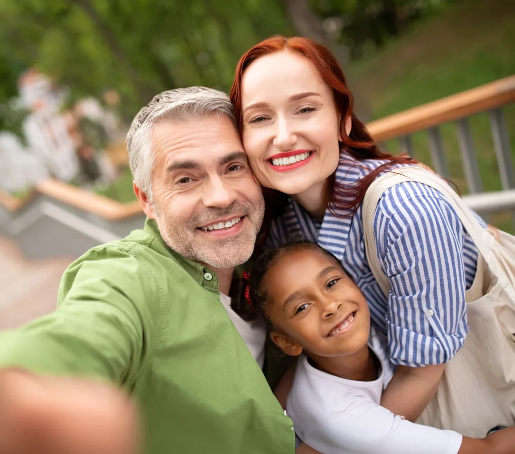 happy family out for a fun afternoon with foster daughter